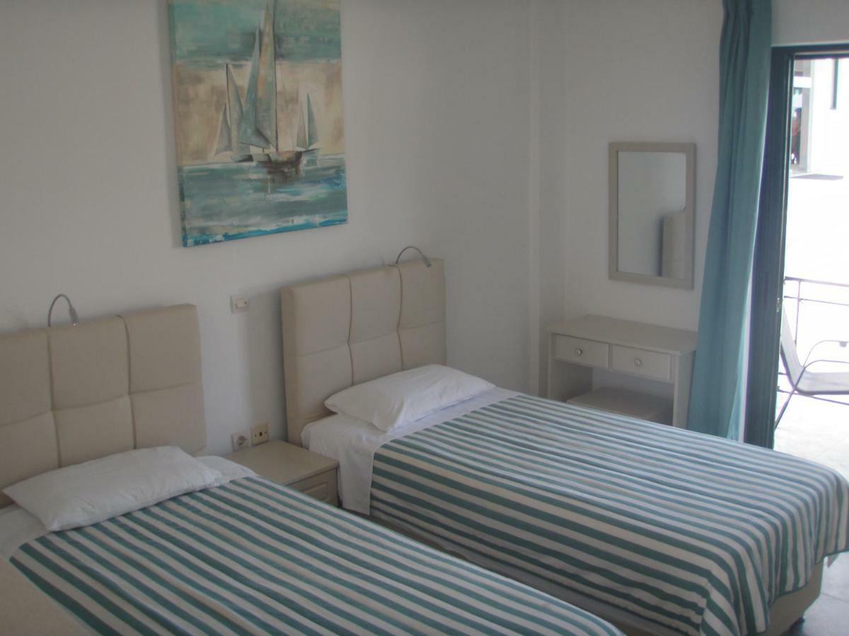 Umbrella Beach Apartments Кавос Екстер'єр фото