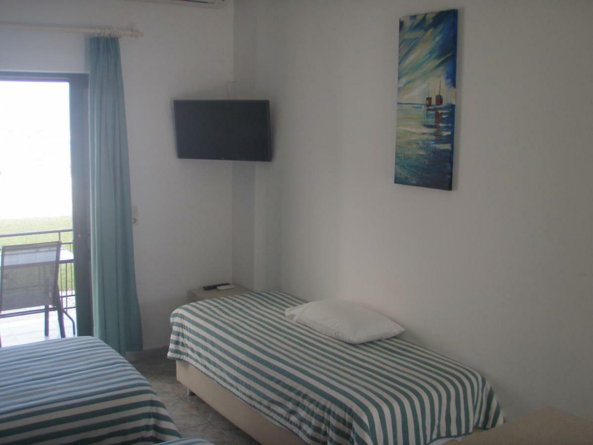 Umbrella Beach Apartments Кавос Екстер'єр фото
